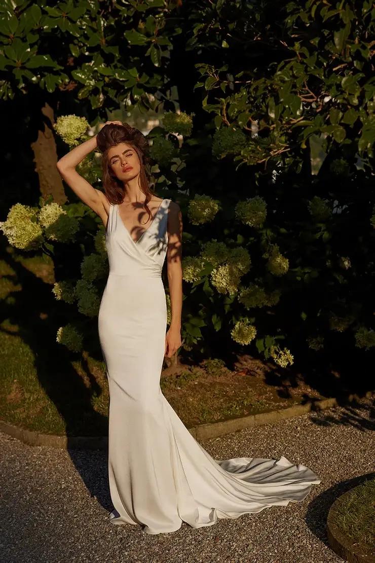 Model wearing a Justin Alexander gown
